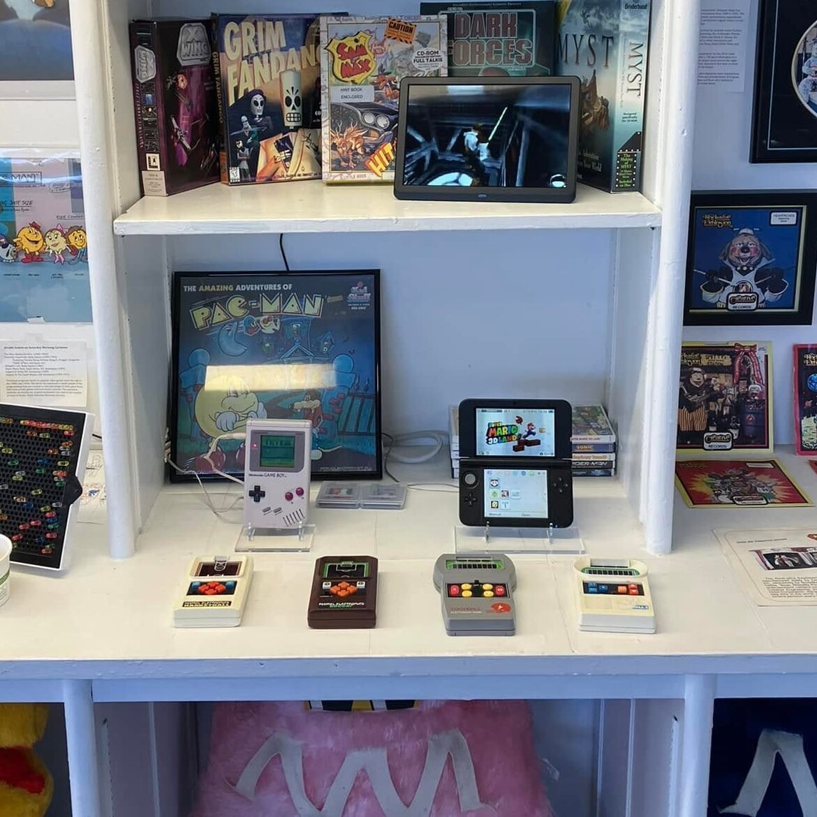 A Game Boy, Nintendo 3DS and vintage handheld electronic games on display